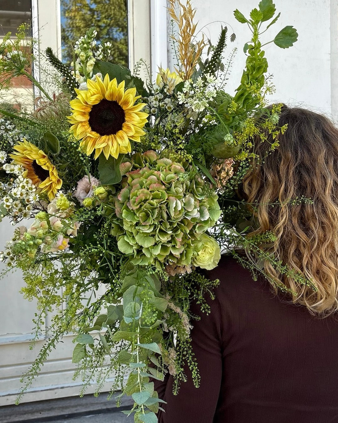 Portræt af Astrid fra Wildflowers i blomsterbutikken i Charlottenlund